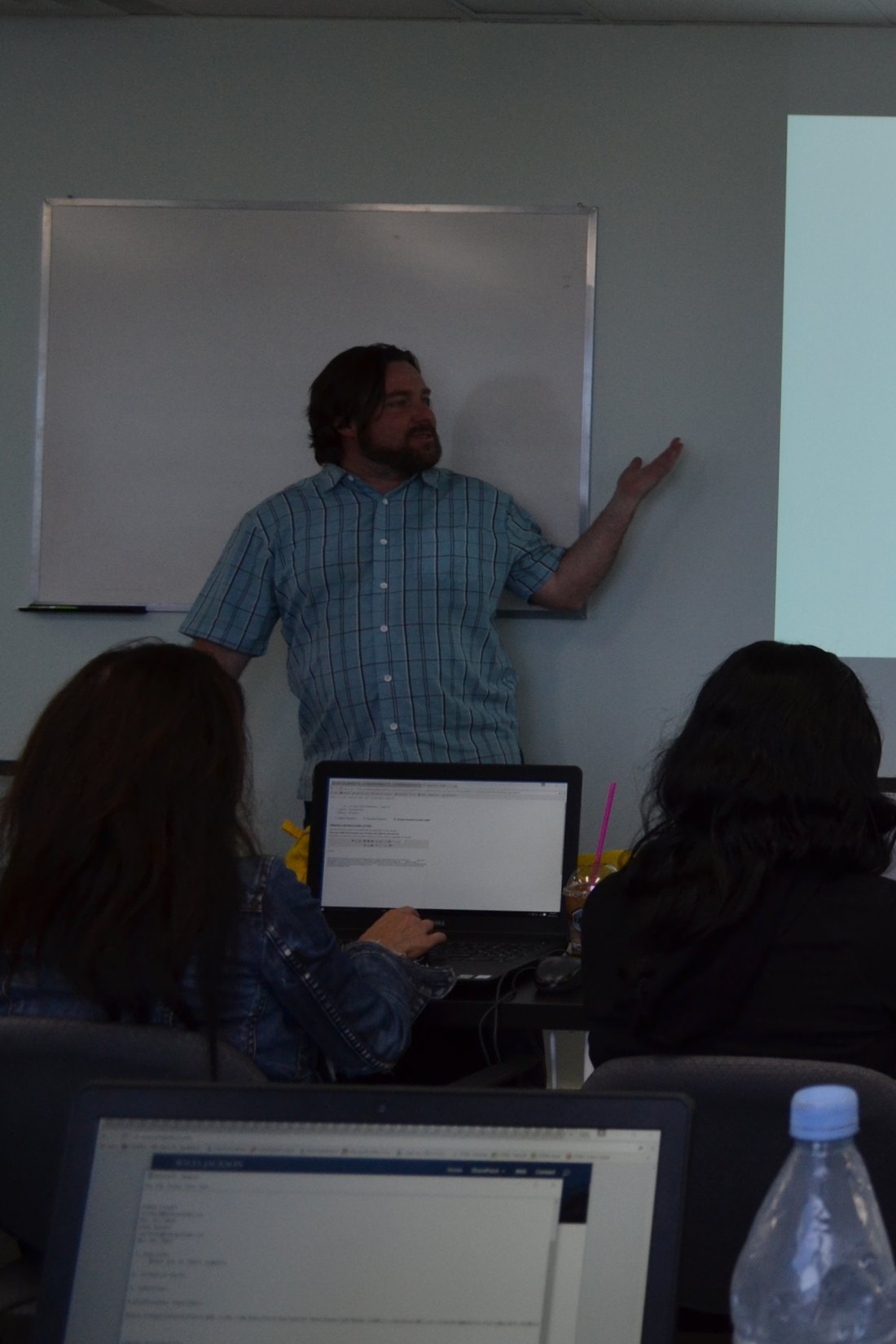 An instructor leading a class at InnoTech College